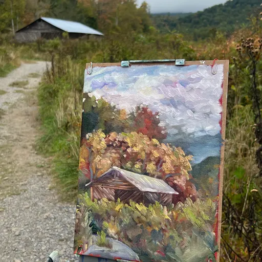 An oil painting depicting a small wooden cabin nestled among autumn-colored trees and foliage, with a misty landscape in the background.